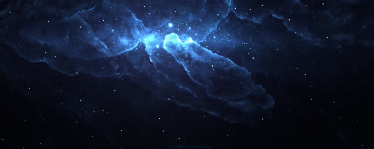 这是一张蓝色星云的图像,背景中有恒星